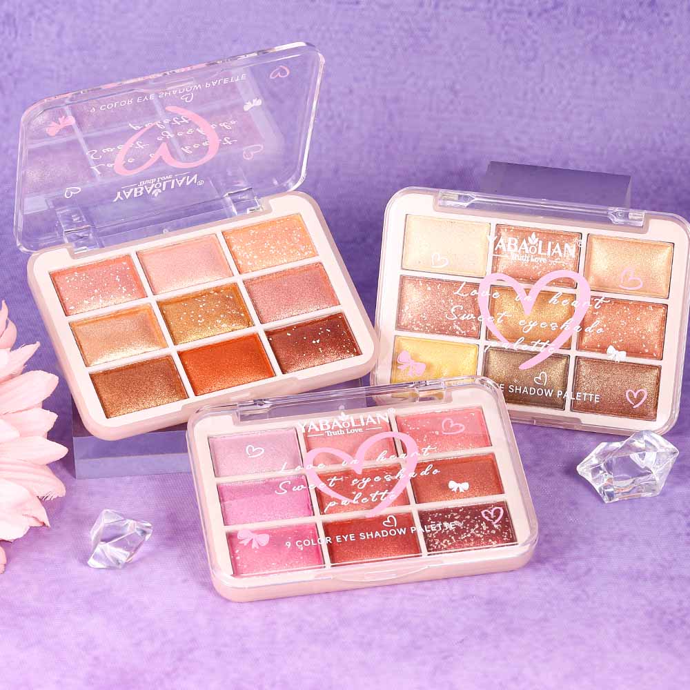 12-color eyeshadow palettes arranged in retail packaging