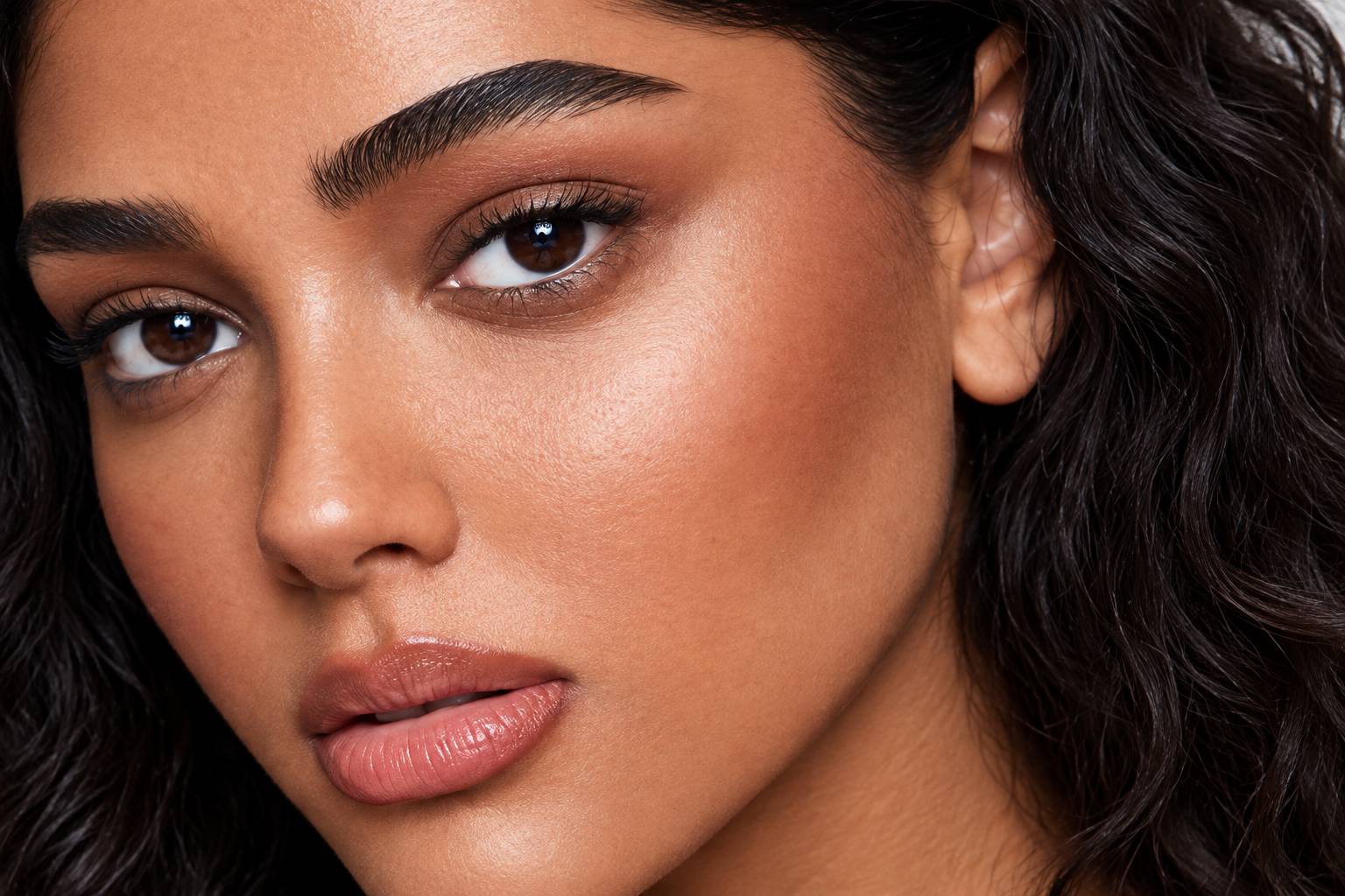 Close-up of a natural cheek finish showing softly blended liquid blush