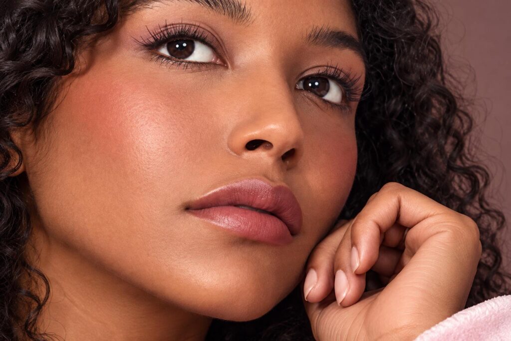Warm natural cheek makeup showing a softly diffused blush finish